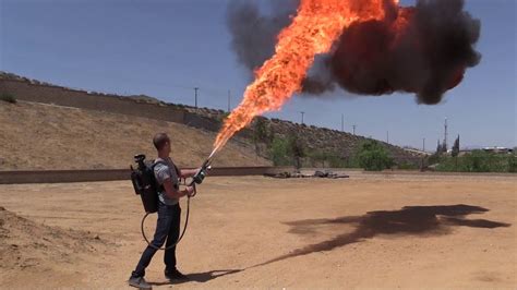Place two rubber bands around an aerosol can. . Diy napalm flamethrower